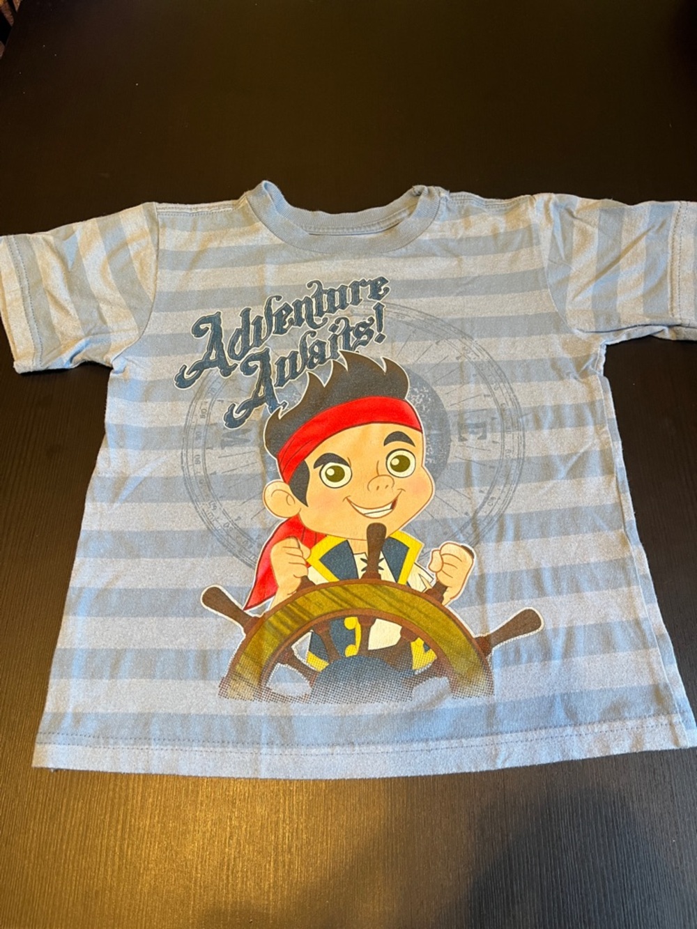 Disney Kids Striped Light Blue Tee with Jake Pirate Graphic - vintage/pre-loved.